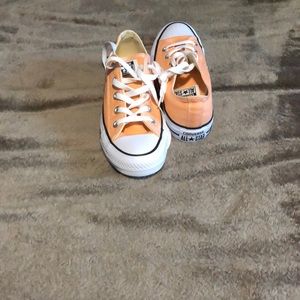 Orange cream converse.